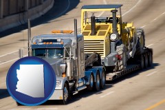 arizona map icon and a semi-truck hauling heavy construction equipment