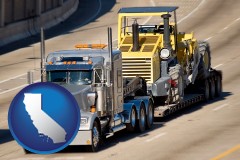 california map icon and a semi-truck hauling heavy construction equipment