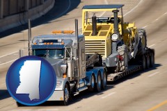 mississippi map icon and a semi-truck hauling heavy construction equipment