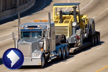 a semi-truck hauling heavy construction equipment - with Washington, DC icon